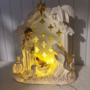 at home Elegant Illuminated Christmas Nativity Scene with Gold Accents‎